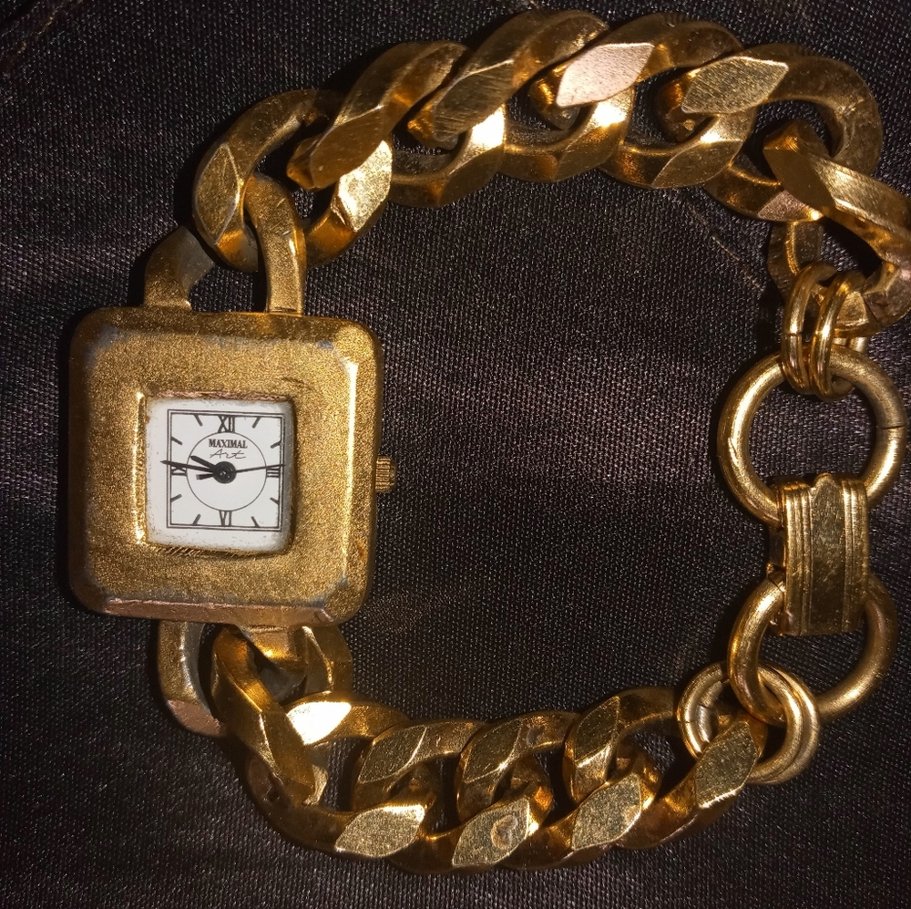 Maximal Art John Wind Gold Tone Hand Watch bracelet